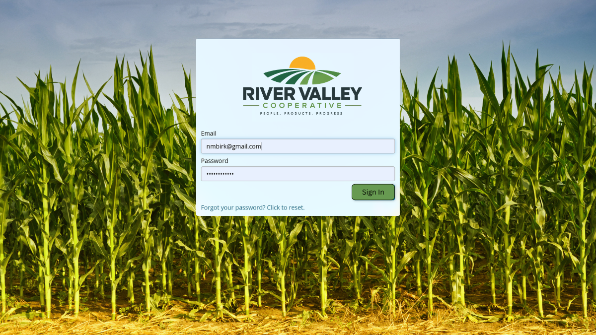 QA Advisor login screen customized with the River Valley Cooperative logo and branded background.